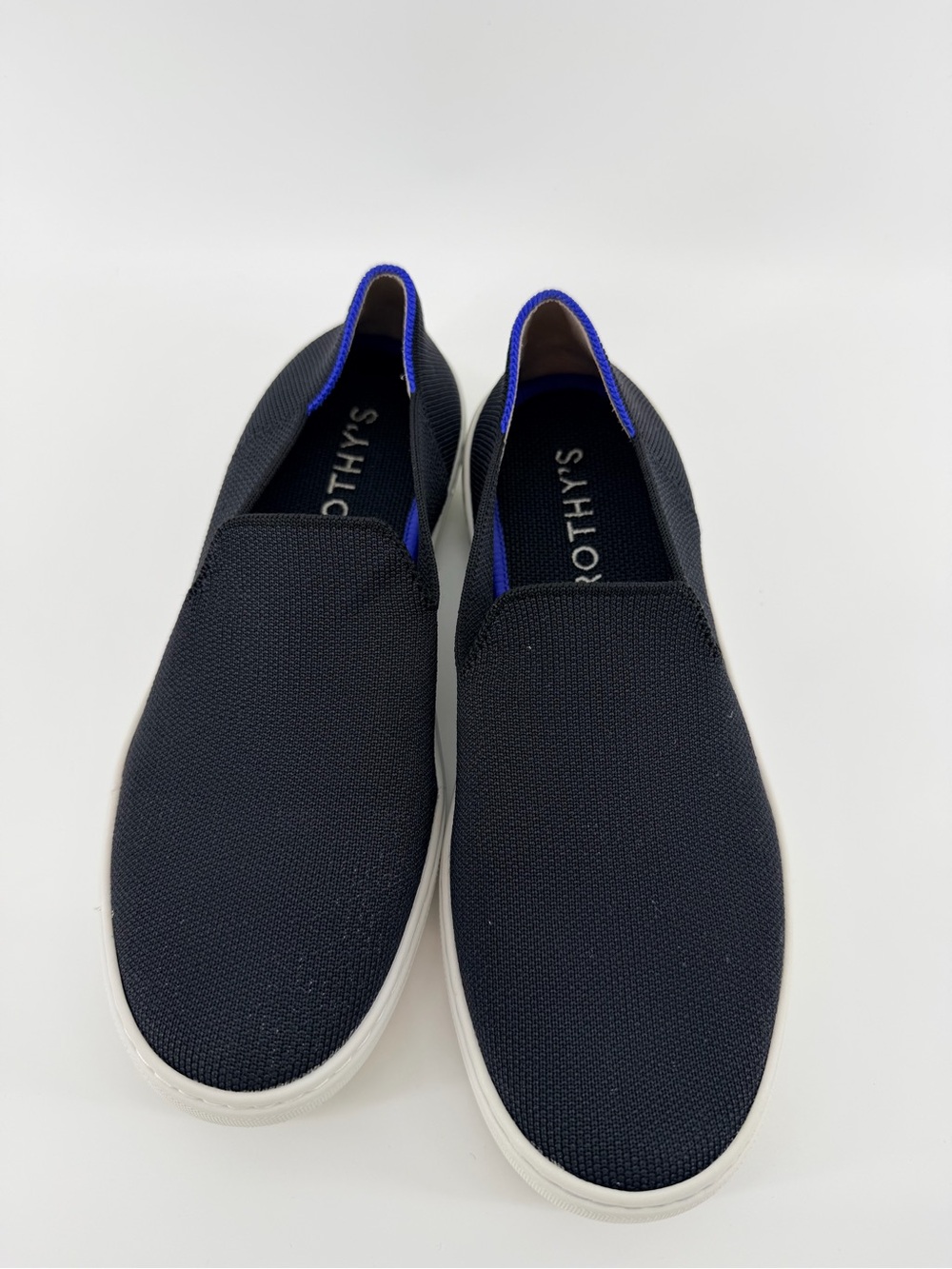 Rothy's Black Knit Original Slip-On Sneakers with Blue & White Heel Tabs - Picture 4 of 7